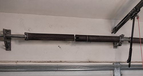 Broken Garage Door Spring Repair Service Image