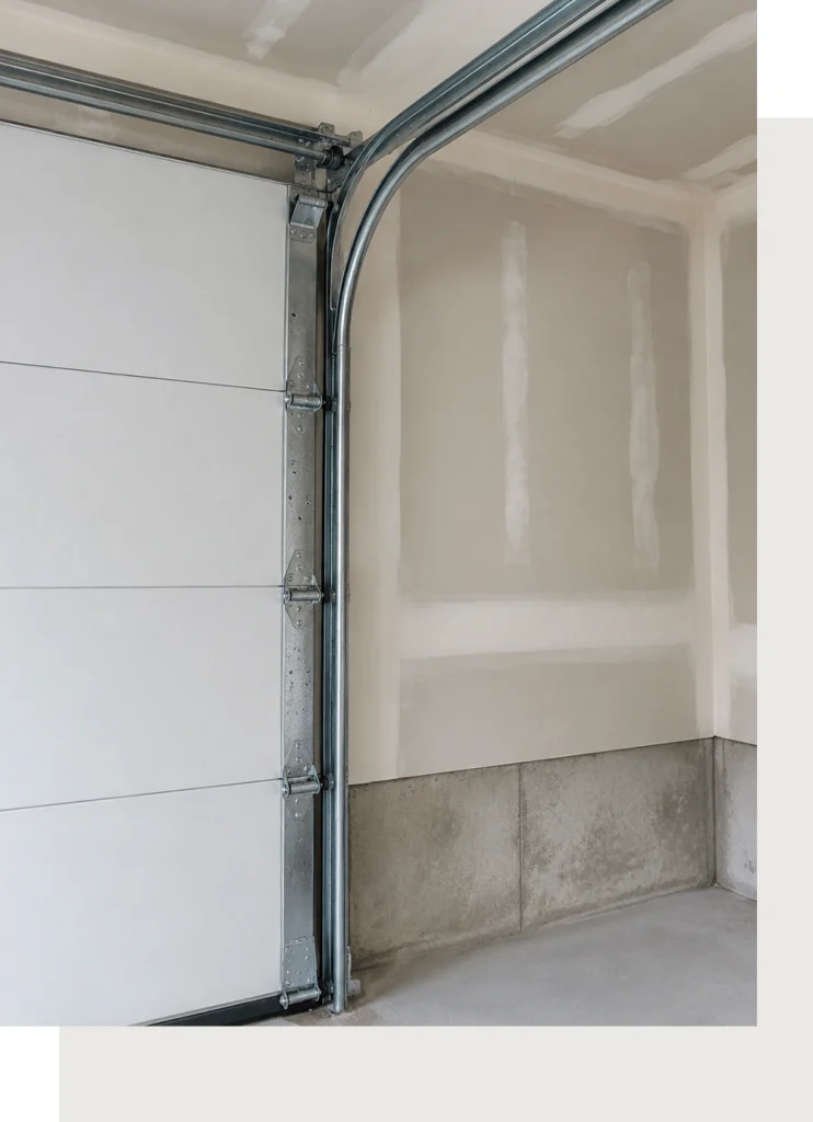Garage Door Track Installation and Repair System Inside Modern Garage